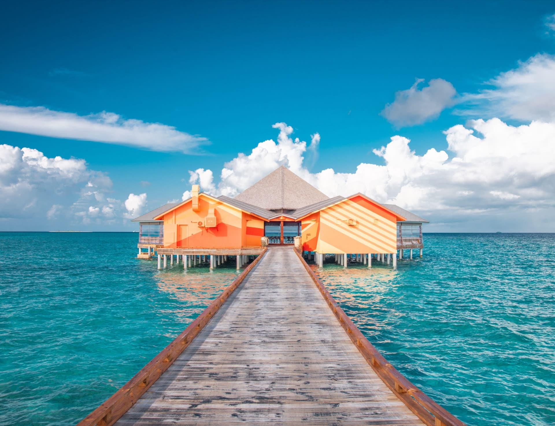 An overwater villa and jetty in the Maldives